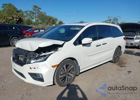 2019 Honda Odyssey Elite z USA, uszkodzony, nr VIN 5FNRL6H93KB105690